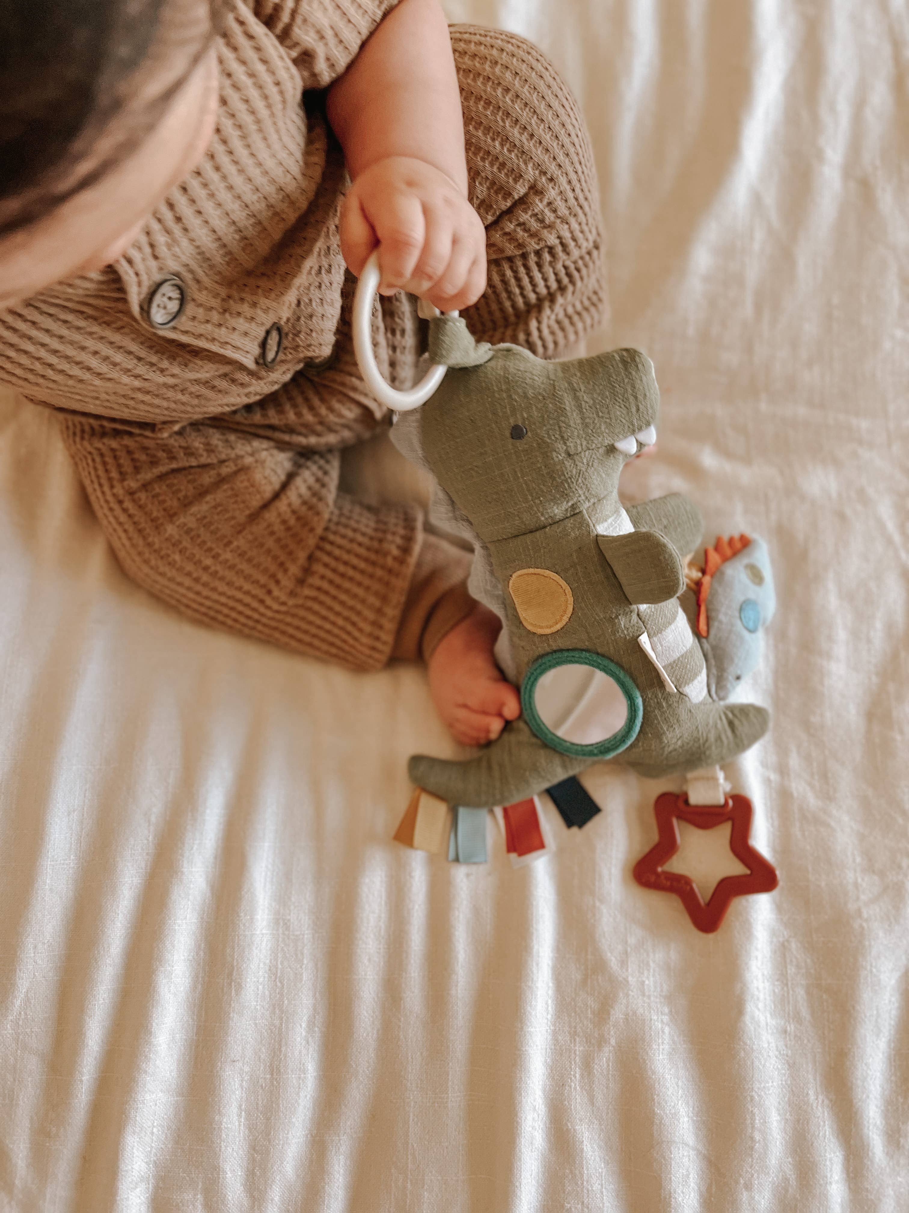 Dinausore ou champignon jouet d'éveil pour bébé Itzy Ritzy -  Bitzy Traveler™